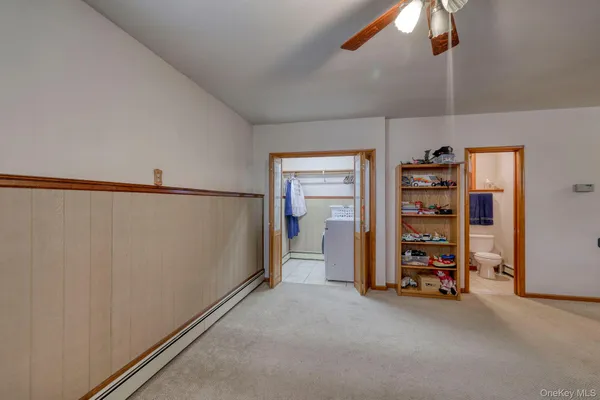 a view of a livingroom with a staircase