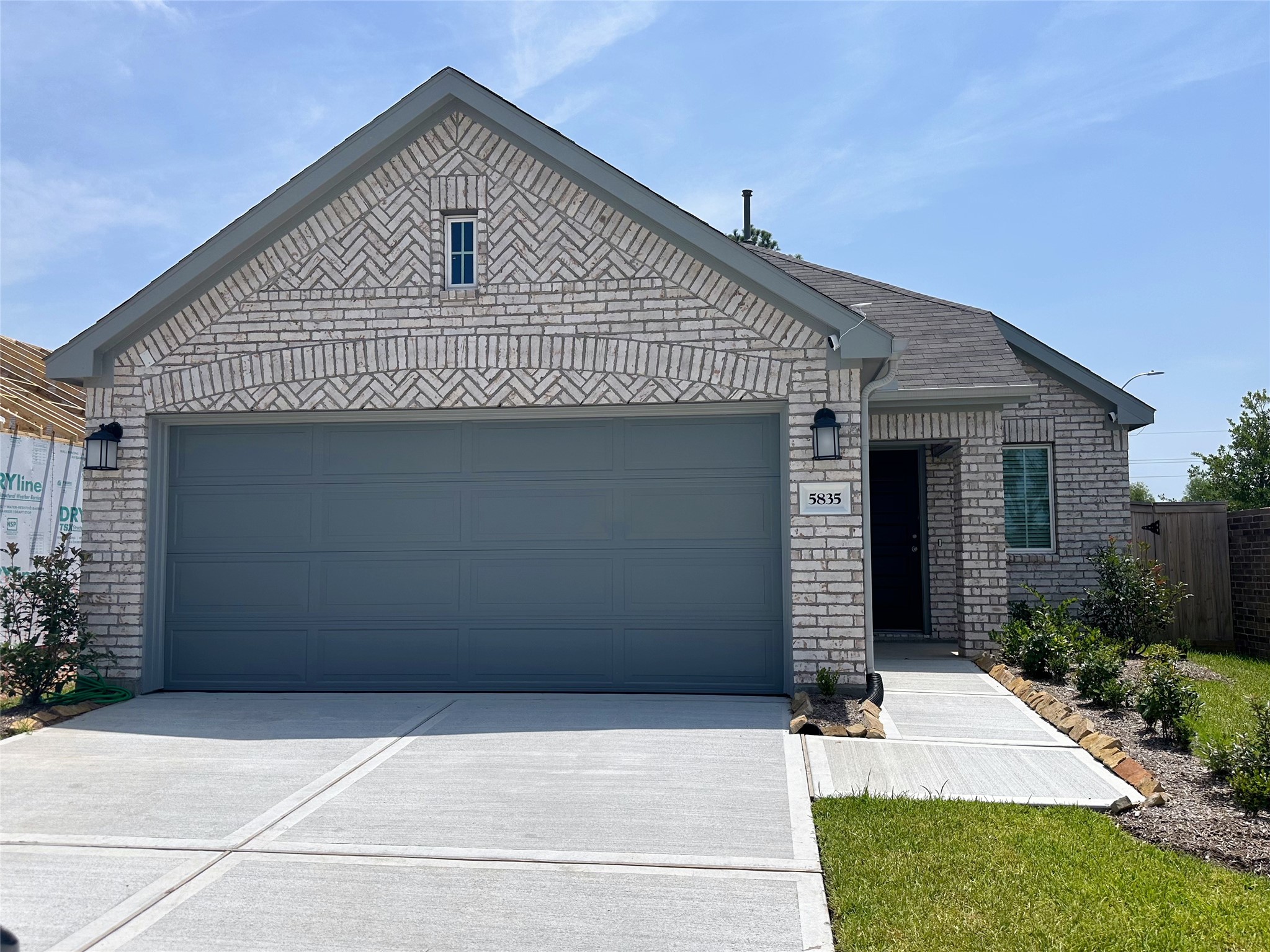 a front view of house with garage