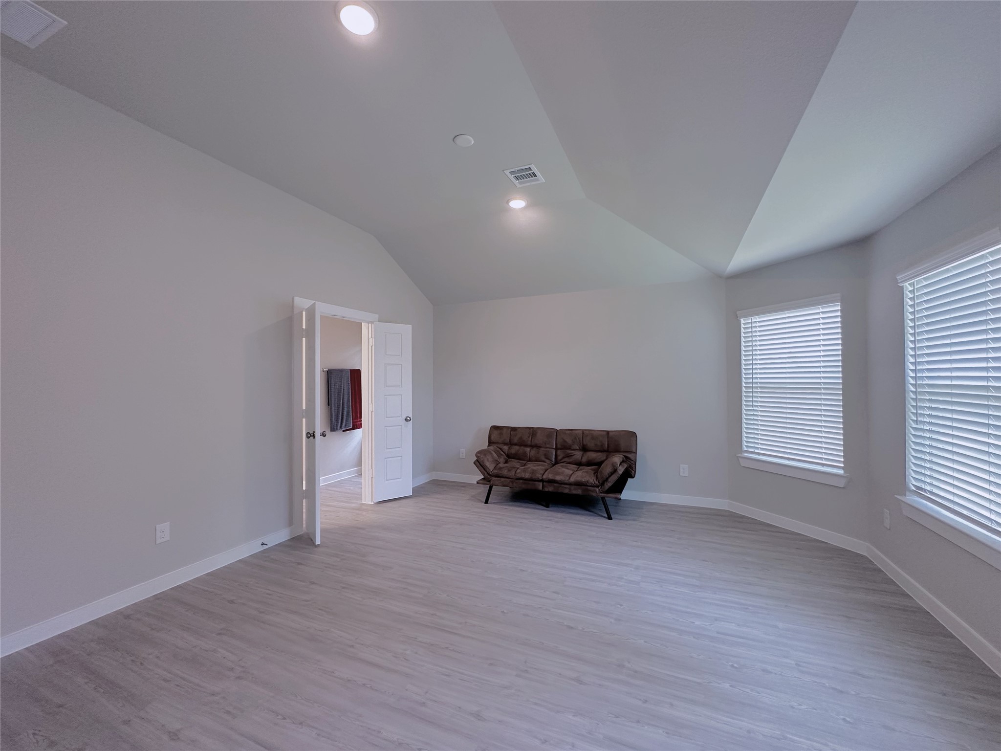 5835 Sunrise Btm Lane Fulshear, TX 77441 - Photo 8 of 22 a view of empty room with wooden floor and windows