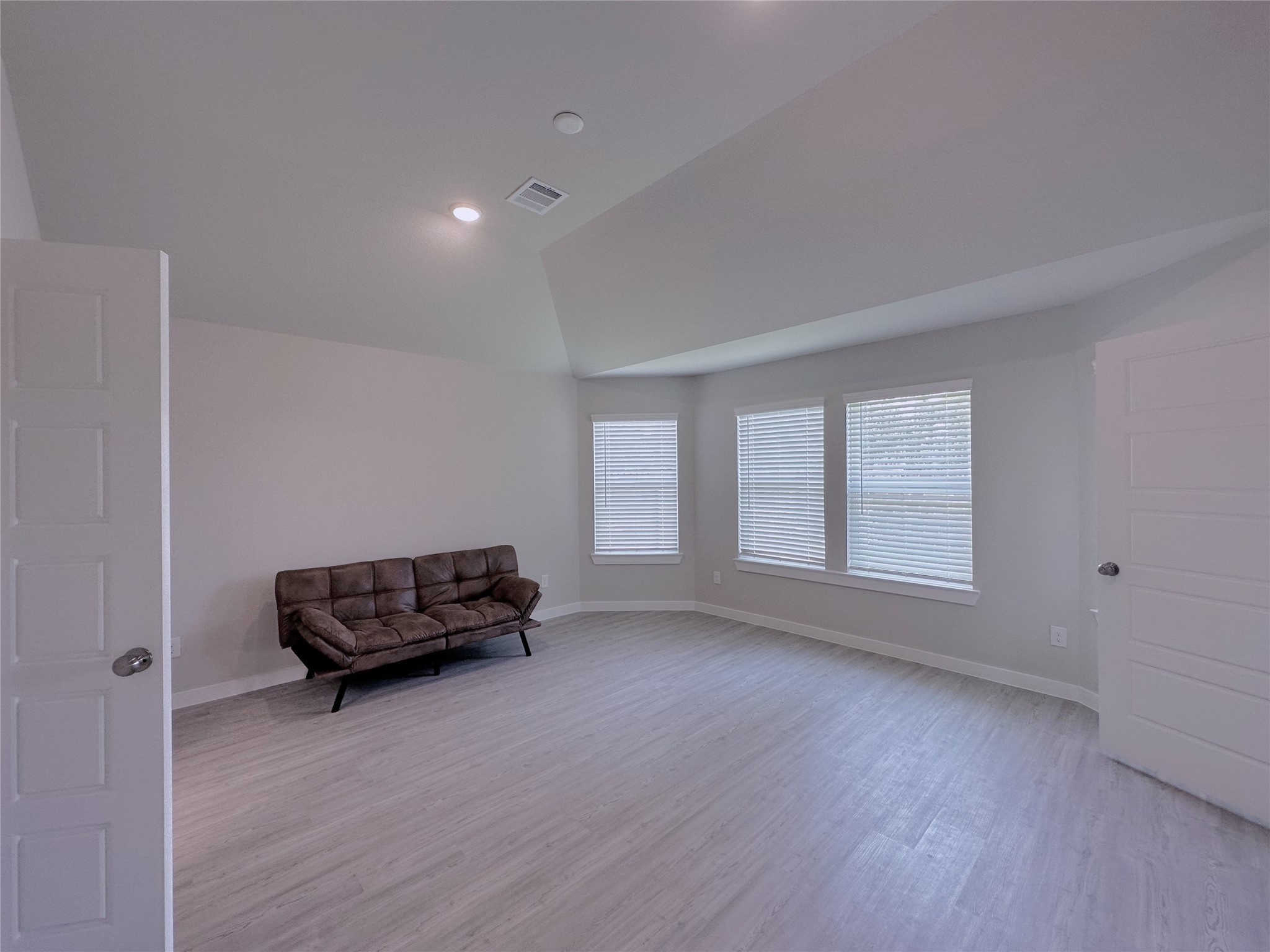 5835 Sunrise Btm Lane Fulshear, TX 77441 - Photo 9 of 22 a living room with furniture window and a wooden floor