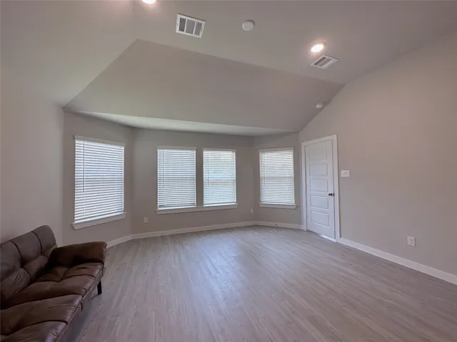 a view of livingroom with furniture and wooden floor