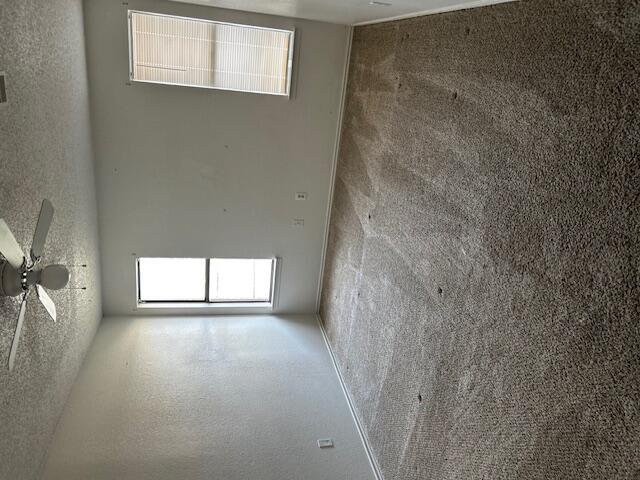 2007 South Loop 289 Lubbock, TX 79423 - Photo 6 of 8 a view of an empty room with a window