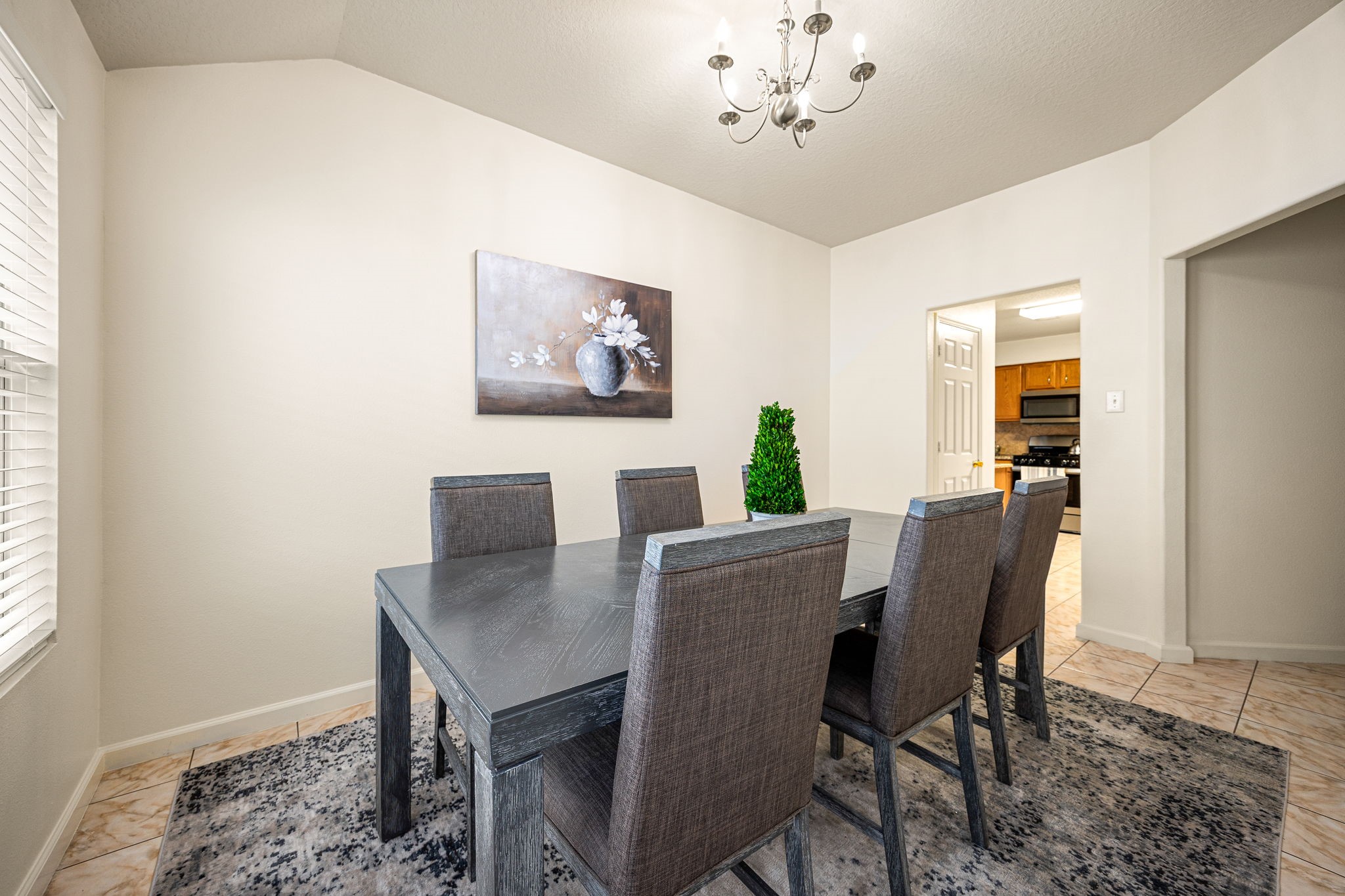 16945 Scenic Knoll Conroe, TX 77385 - Photo 20 of 39 a view of a dining room with furniture and window