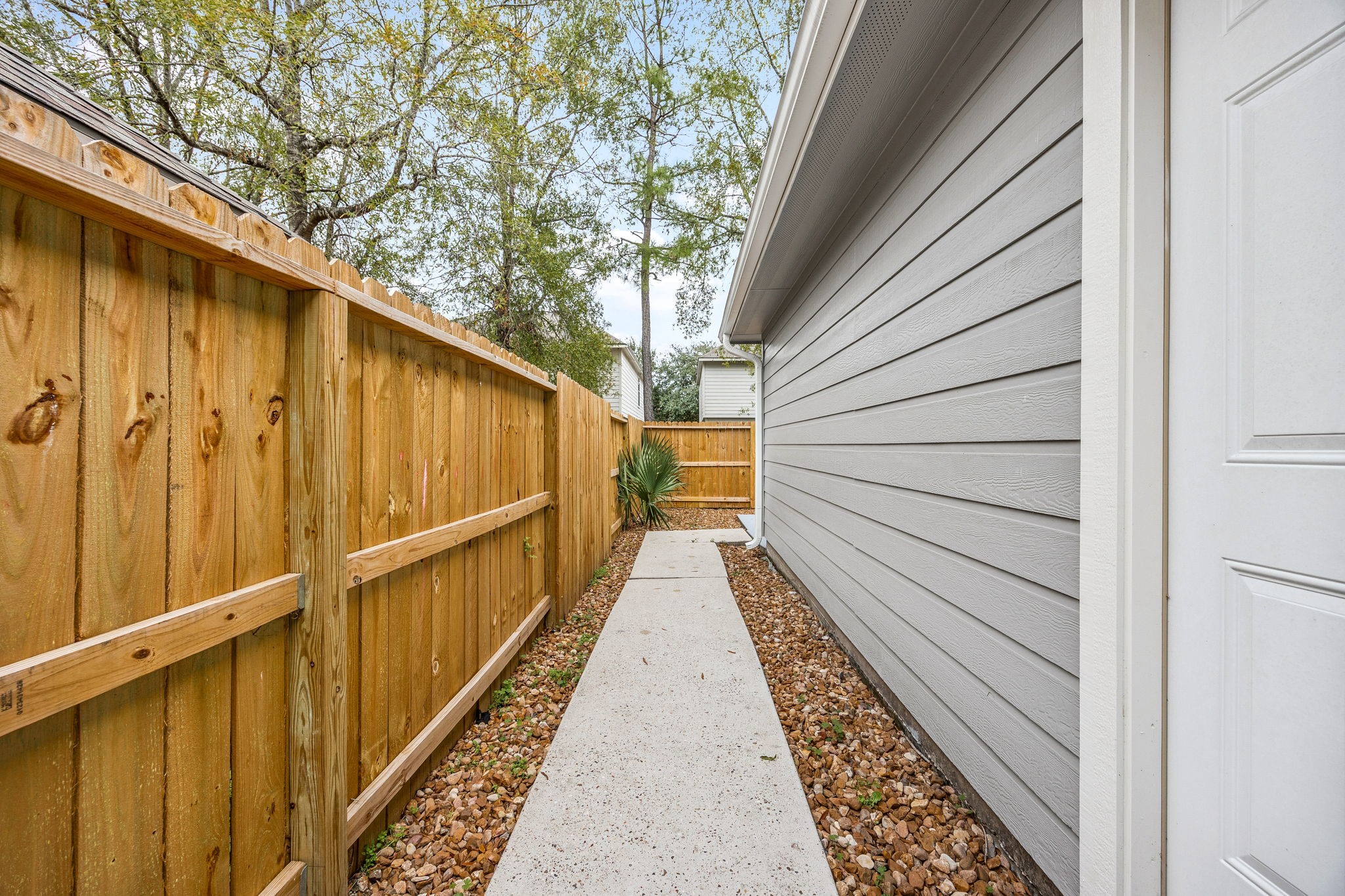 16945 Scenic Knoll Conroe, TX 77385 - Photo 32 of 39 a view of a pathway with a backyard
