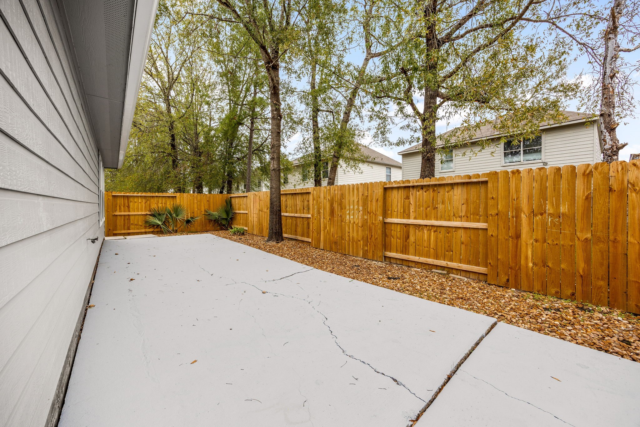 16945 Scenic Knoll Conroe, TX 77385 - Photo 33 of 39 a view of backyard with large tree