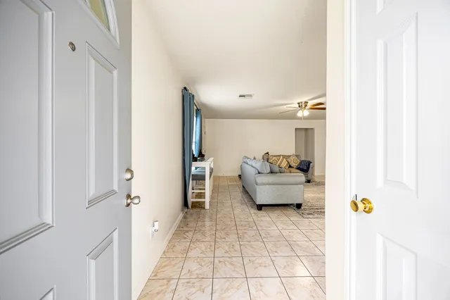 a living room with a couch and a table