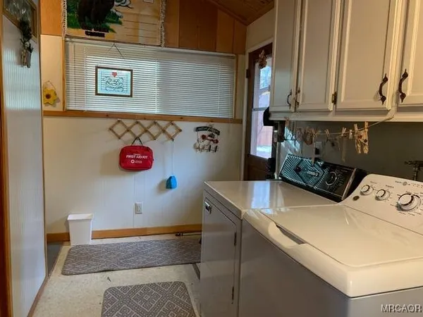 a bathroom with a sink and mirror