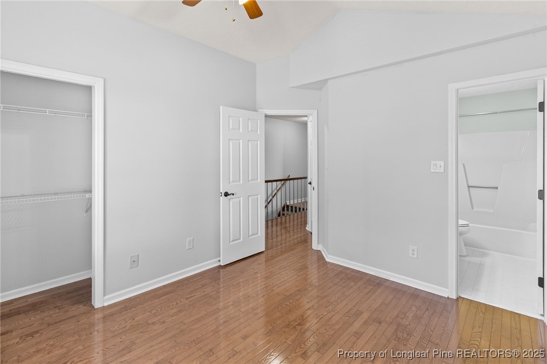 484 Lands End Road Fayetteville, NC 28314 - Photo 29 of 41 an empty room with wooden floor and windows