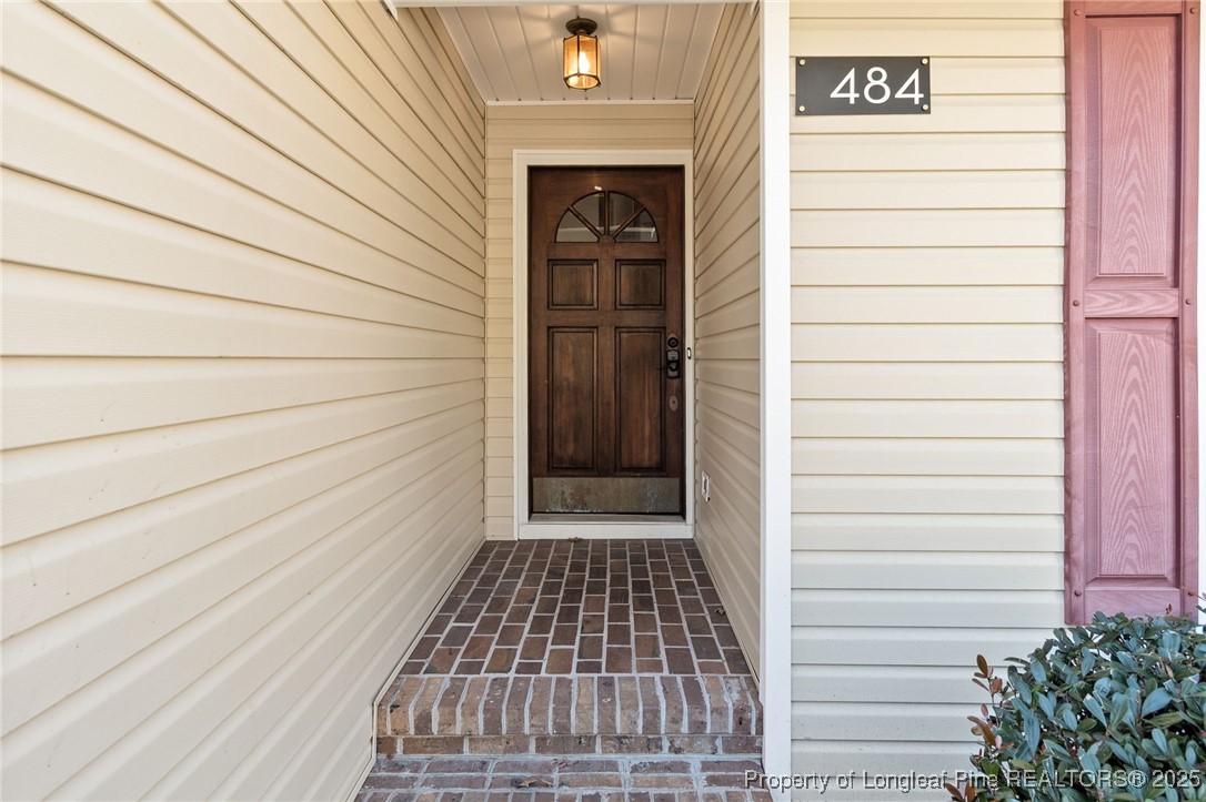 484 Lands End Road Fayetteville, NC 28314 - Photo 6 of 41 a view of a door and brick walls
