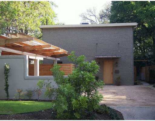 3220 Windsor Road, Unit A Austin, TX 78703 - Photo 1 of 1 front view of a house with a yard