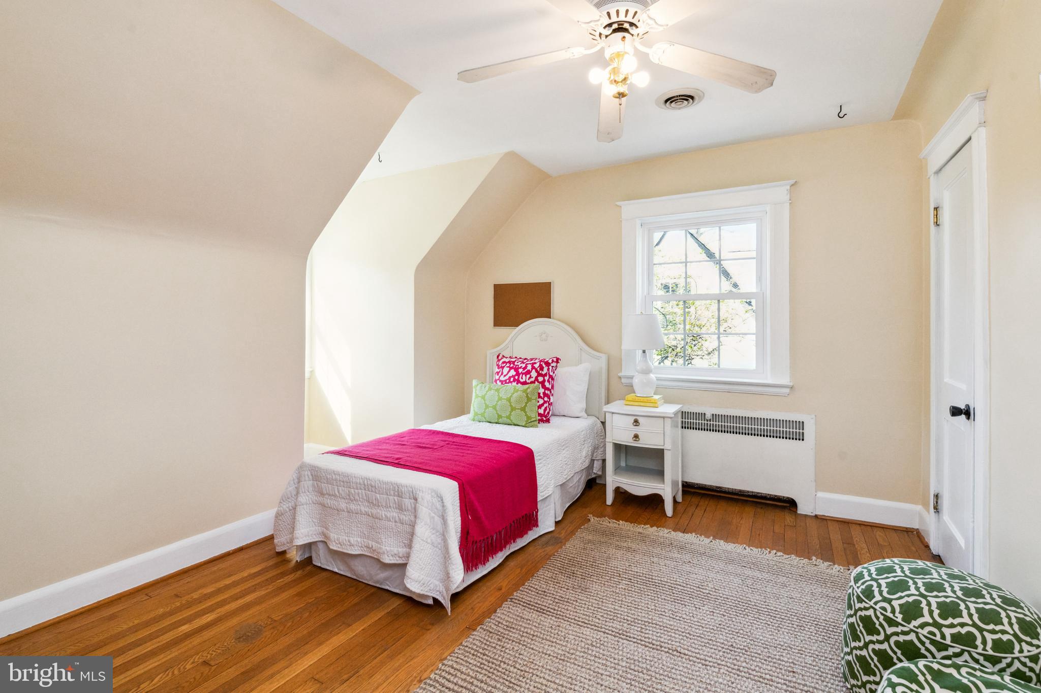 716 Anneslie Road Baltimore, MD 21212 - Photo 20 of 27 a bedroom with a bed and a chandelier