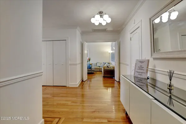 a view of a hallway view with living room