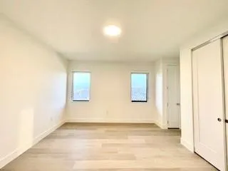 an empty room with windows