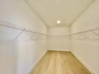 a view of a room with racks on the wall