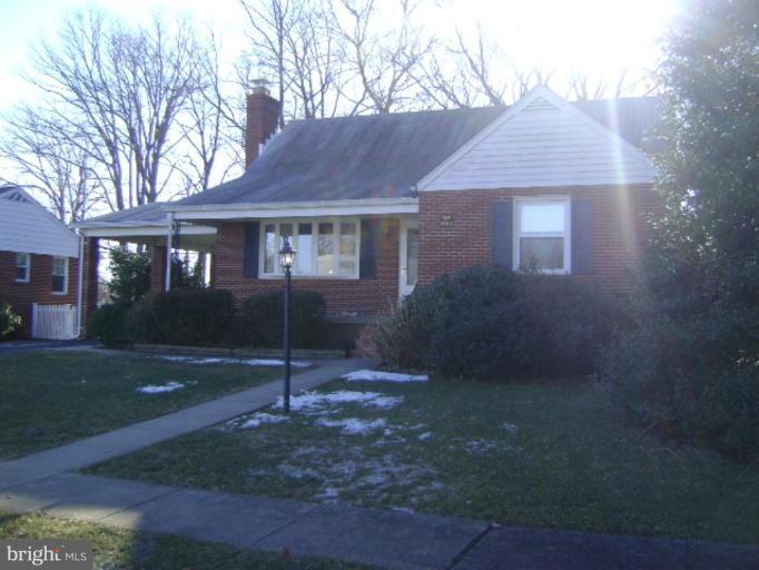 9823 Forge Park Road Perry Hall, MD 21128 - Photo 2 of 14 a view of a house with a yard