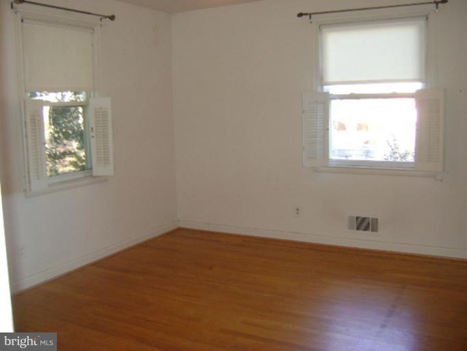 9823 Forge Park Road Perry Hall, MD 21128 - Photo 10 of 14 an empty room with a window