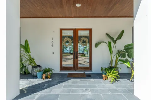 a view of swimming pool with seating space