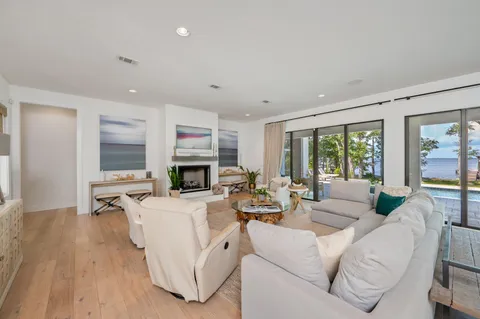 a view of a house with swimming pool and a yard