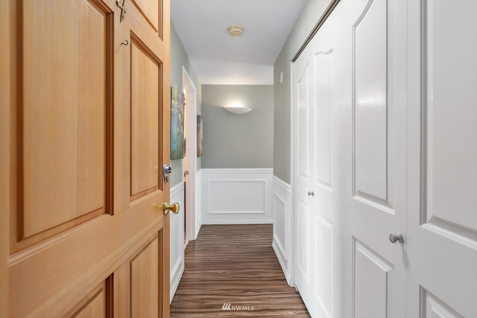 555 Walnut Street, Unit 4 Edmonds, WA 98020 - Photo 16 of 16 a view of a hallway with wooden floor and staircase