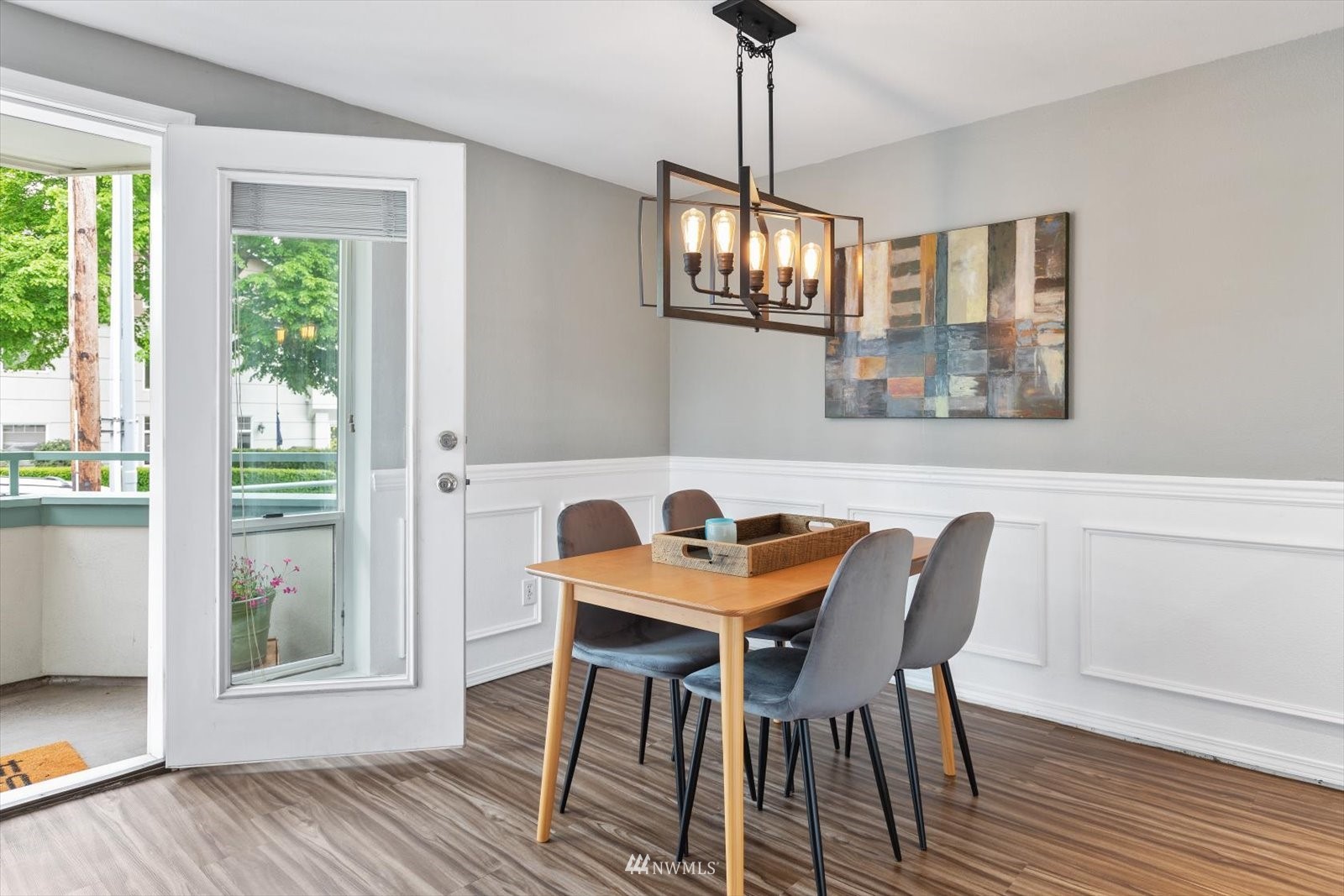 555 Walnut Street, Unit 4 Edmonds, WA 98020 - Photo 4 of 16 a view of a dining room with furniture window and wooden floor