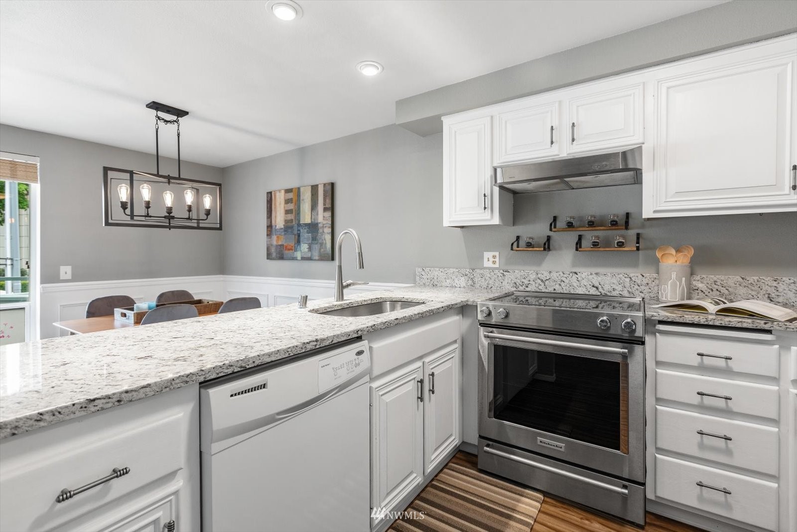 555 Walnut Street, Unit 4 Edmonds, WA 98020 - Photo 8 of 16 a kitchen with a sink stove and cabinets