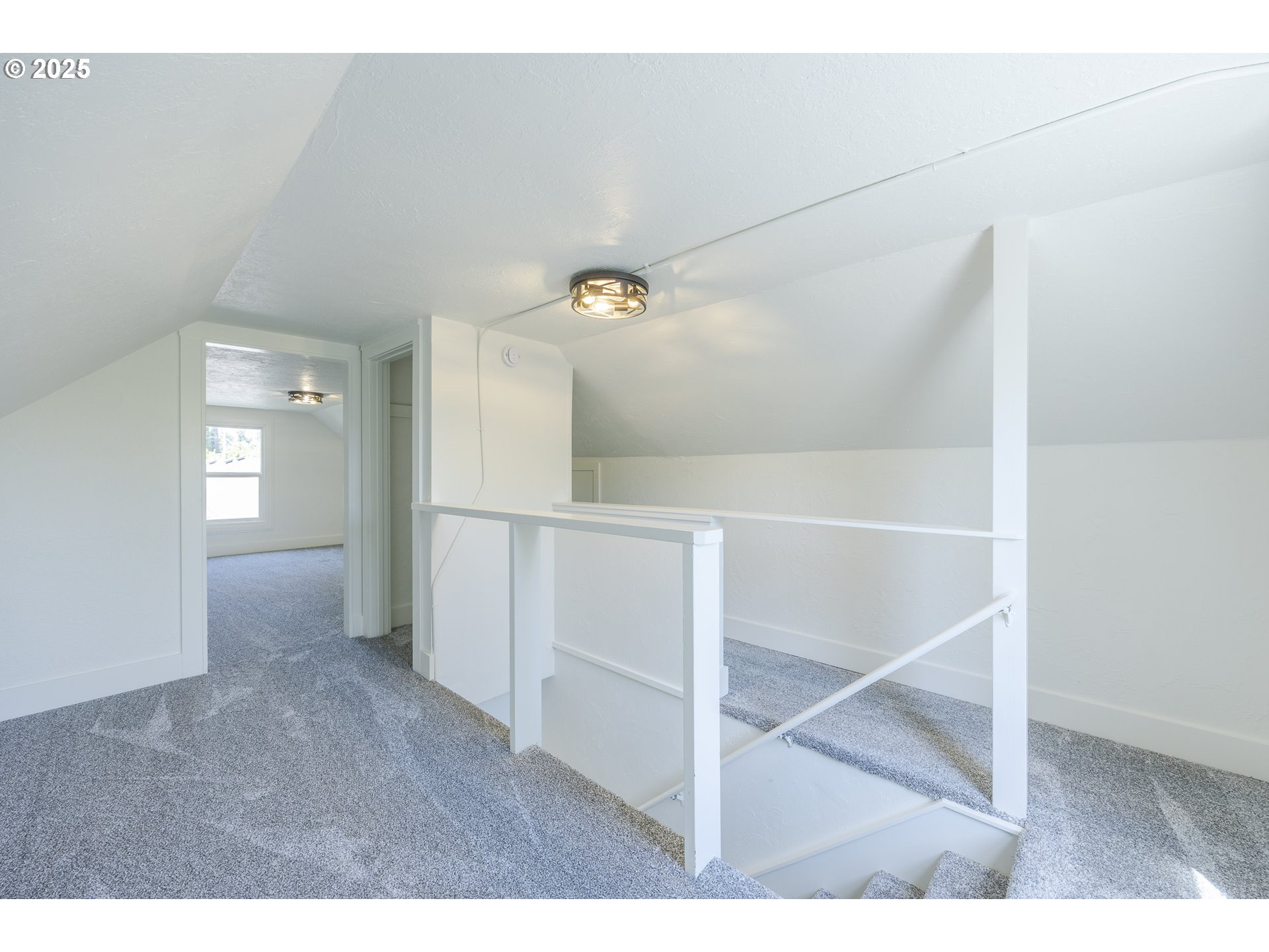 155 B Street Springfield, OR 97477 - Photo 32 of 42 a view of an empty room with wooden floor and a window