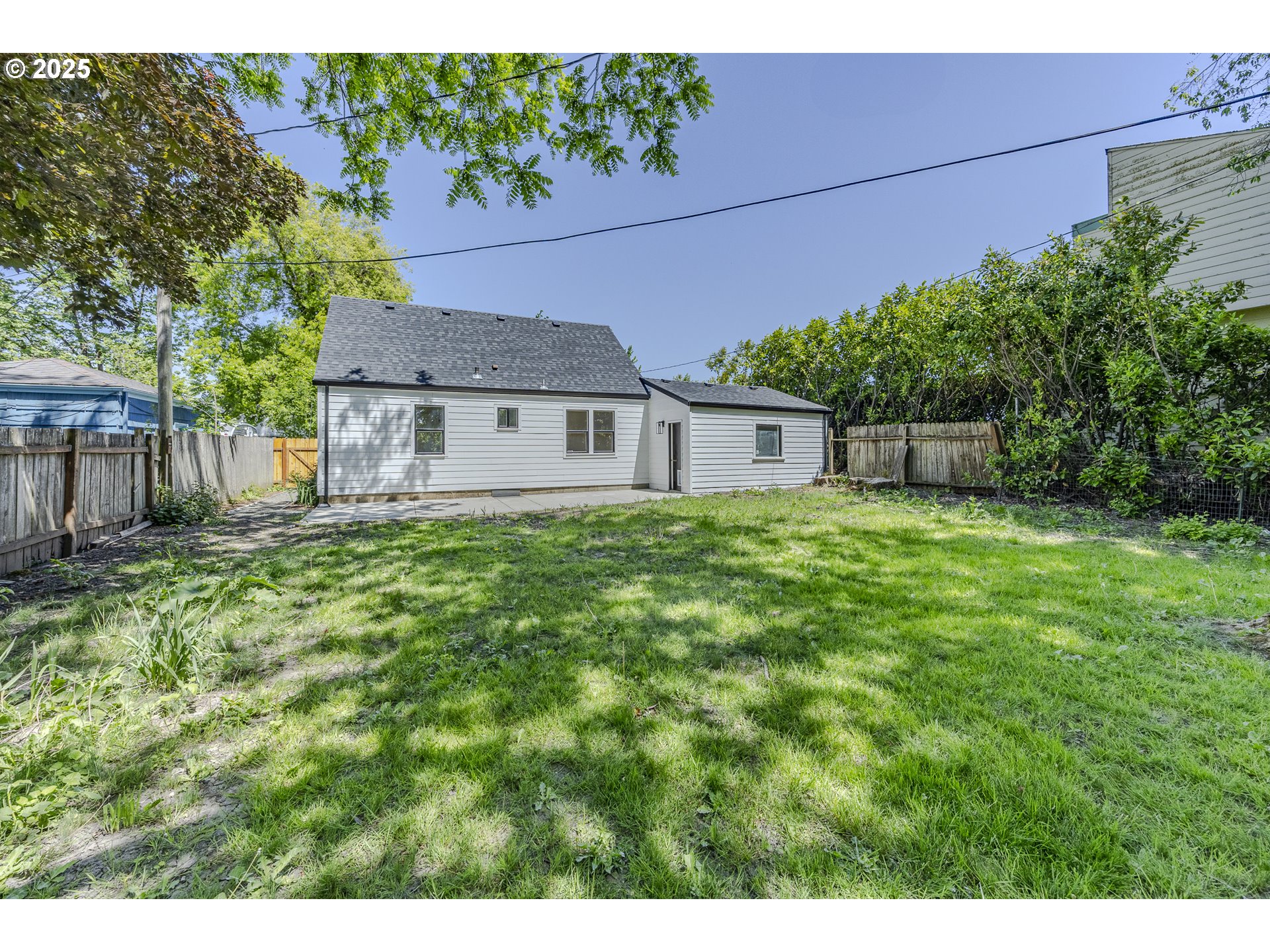 155 B Street Springfield, OR 97477 - Photo 41 of 42 a view of a house with a yard