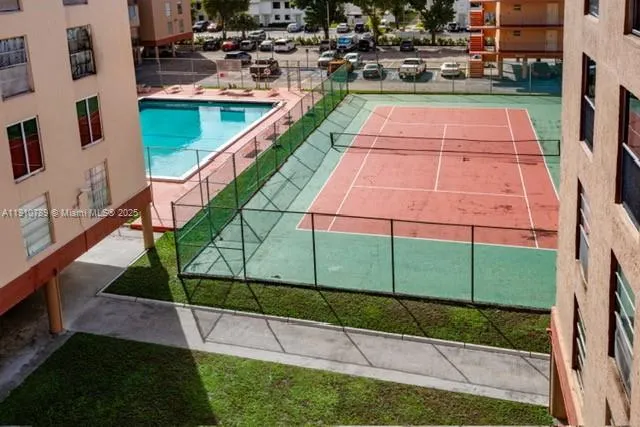 a view of a yard with an outdoor seating