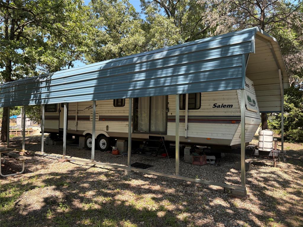 Tbd Indian Gap Road Quitman, TX 75783 - Photo 4 of 21 a front view of a house with a balcony