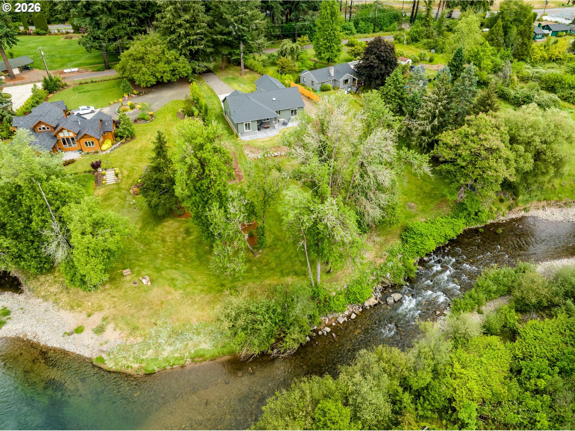 45542 South Gate Creek Road Vida, OR 97488 - Photo 35 of 46 a view of a large yard with lots of green space