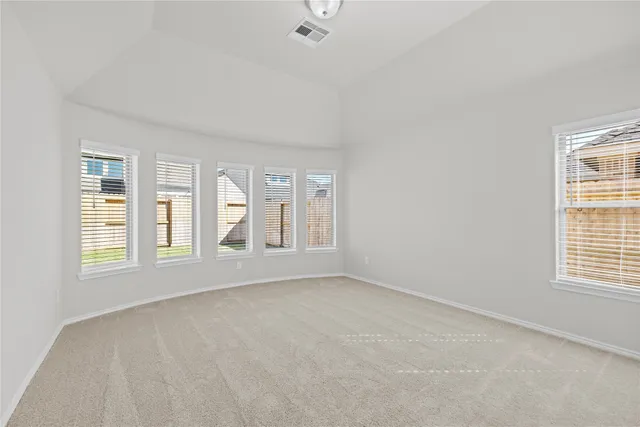 an empty room with windows