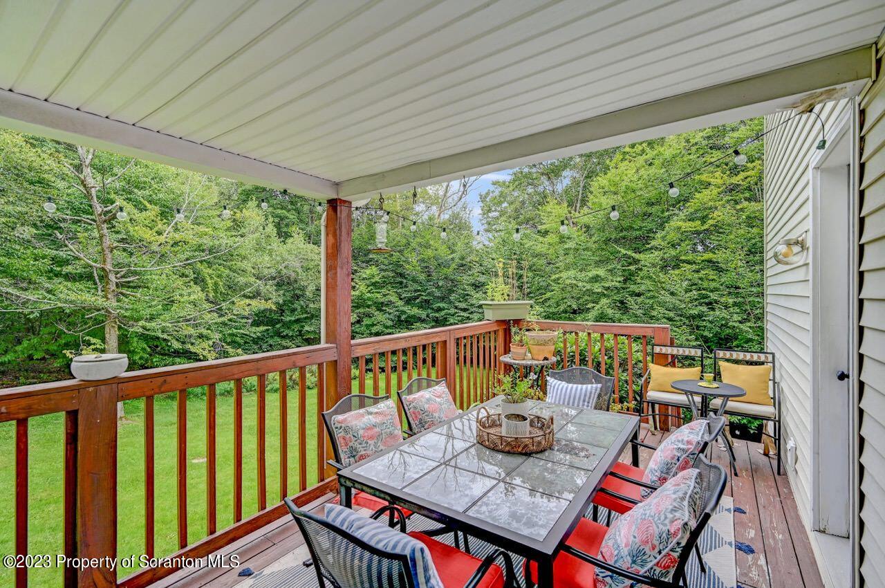 196 Elkview Drive Forest City, PA 18421 - Photo 51 of 67 a view of balcony with furniture and wooden deck