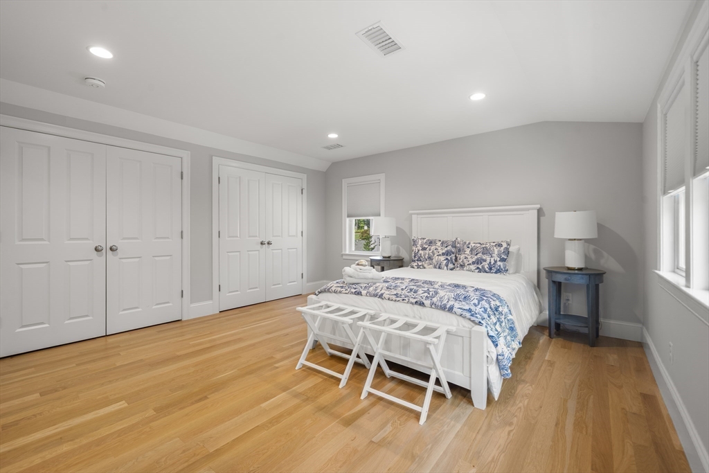 3 Bascom Hollow Harwich, MA 02645 - Photo 20 of 32 a bedroom with a bed and a table in it