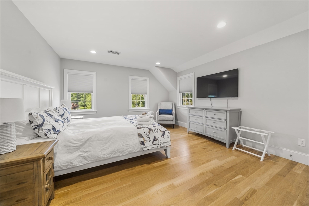 3 Bascom Hollow Harwich, MA 02645 - Photo 23 of 32 a bedroom with a bed and furniture