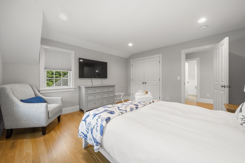 3 Bascom Hollow Harwich, MA 02645 - Photo 24 of 32 a bedroom with a bed and a couch