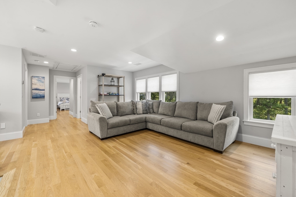 3 Bascom Hollow Harwich, MA 02645 - Photo 25 of 32 a living room with furniture and a large window