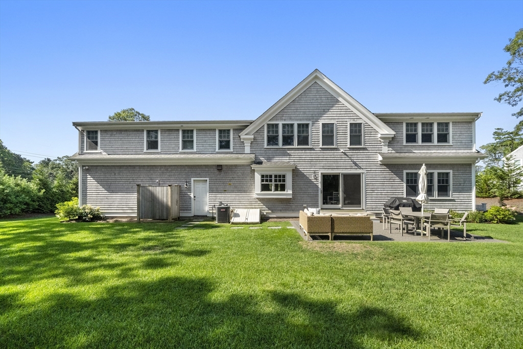 3 Bascom Hollow Harwich, MA 02645 - Photo 31 of 32 a front view of house with yard