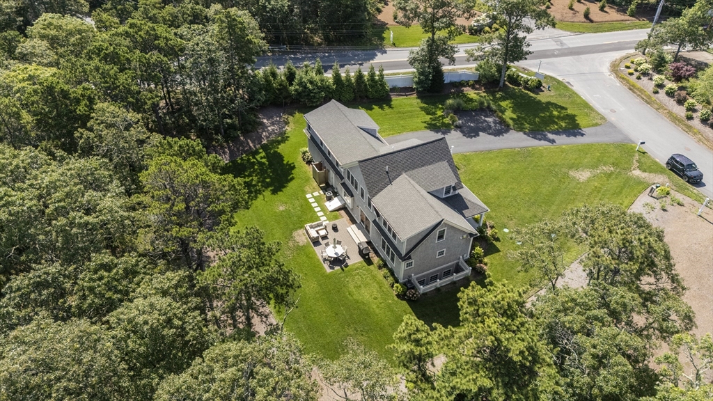 3 Bascom Hollow Harwich, MA 02645 - Photo 32 of 32 an aerial view of a house with a yard
