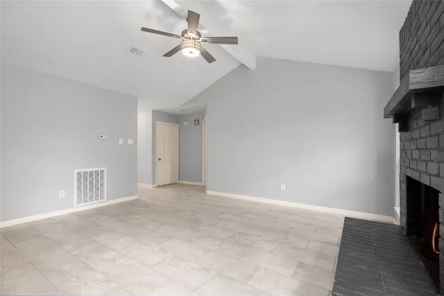 a view of a livingroom with a ceiling fan