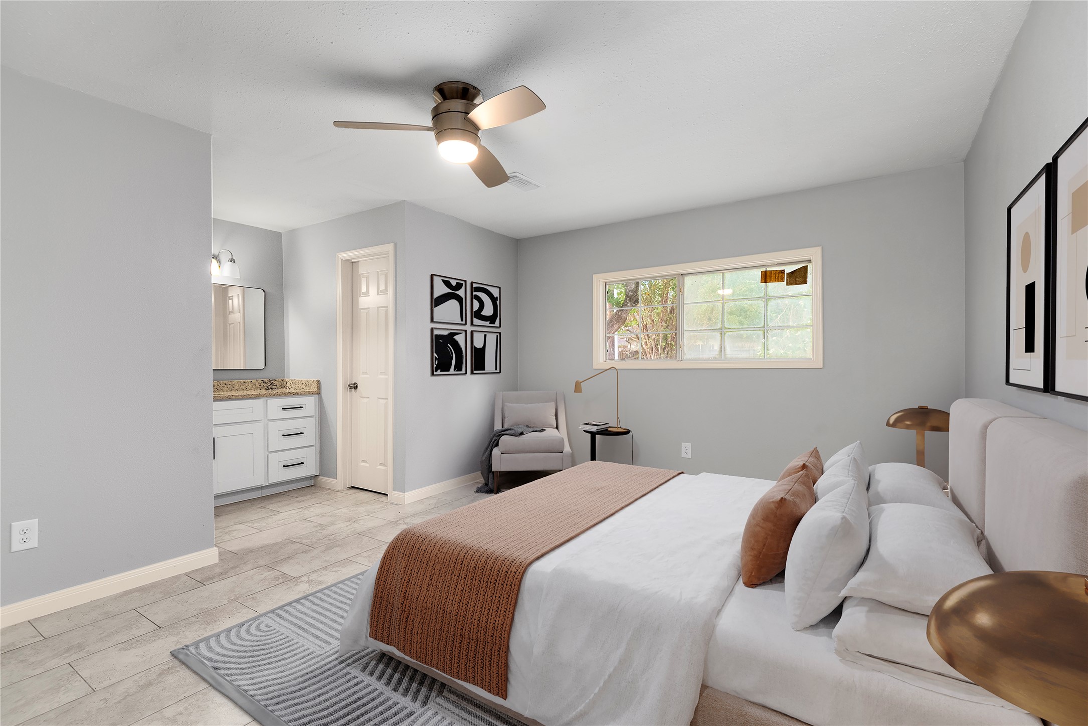 4919 Tealgate Drive Spring, TX 77373 - Photo 22 of 38 a bedroom with a large bed and a chandelier