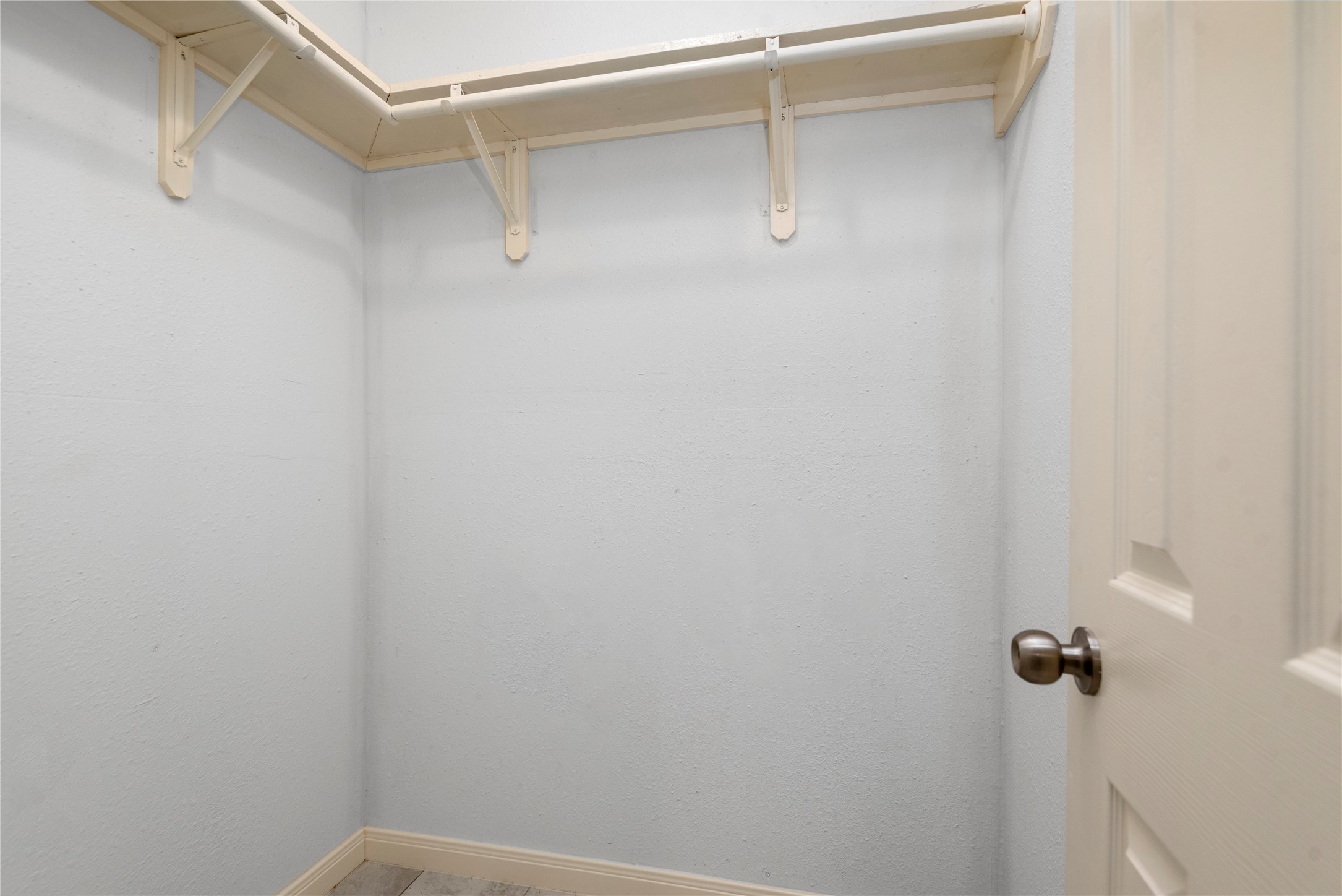 4919 Tealgate Drive Spring, TX 77373 - Photo 28 of 38 a view of a room with racks on the wall