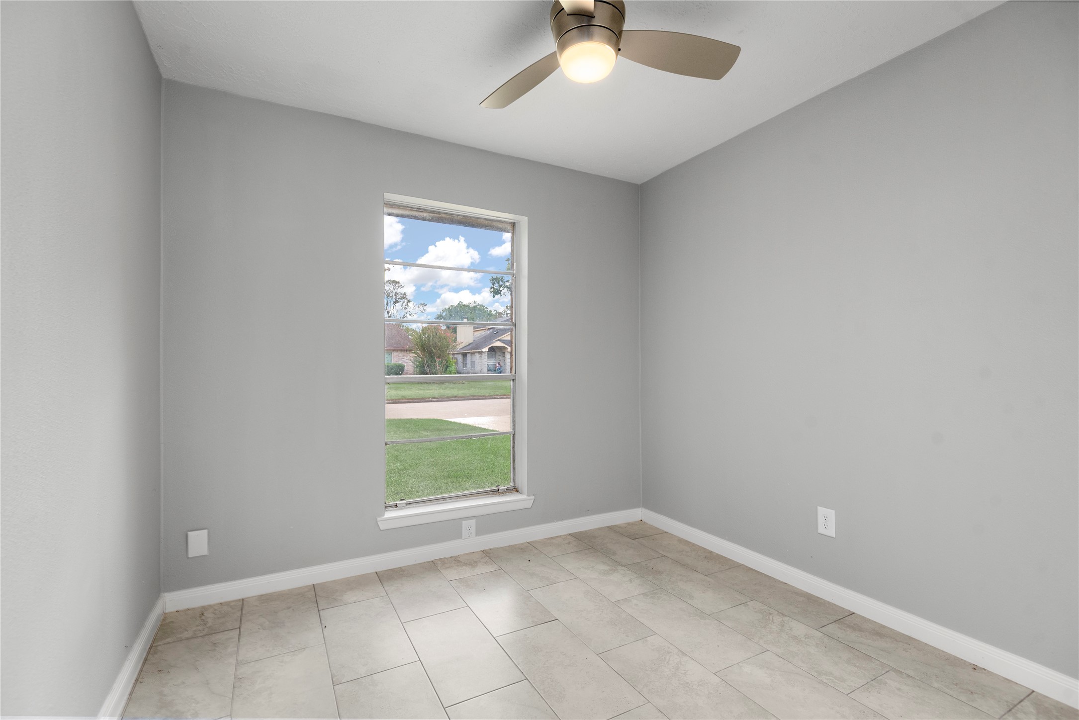 4919 Tealgate Drive Spring, TX 77373 - Photo 32 of 38 an empty room with windows