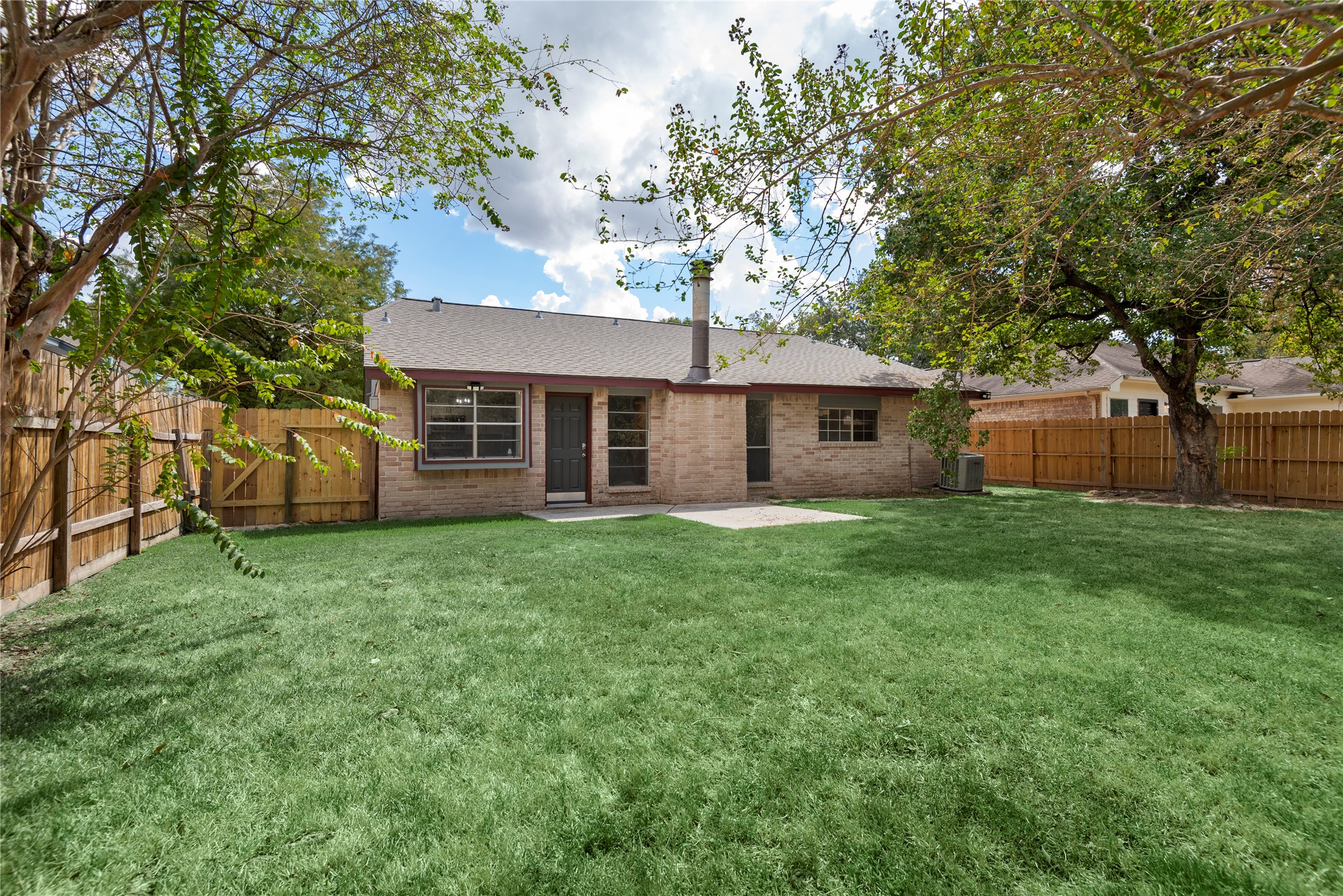 4919 Tealgate Drive Spring, TX 77373 - Photo 37 of 38 a view of a house with a backyard