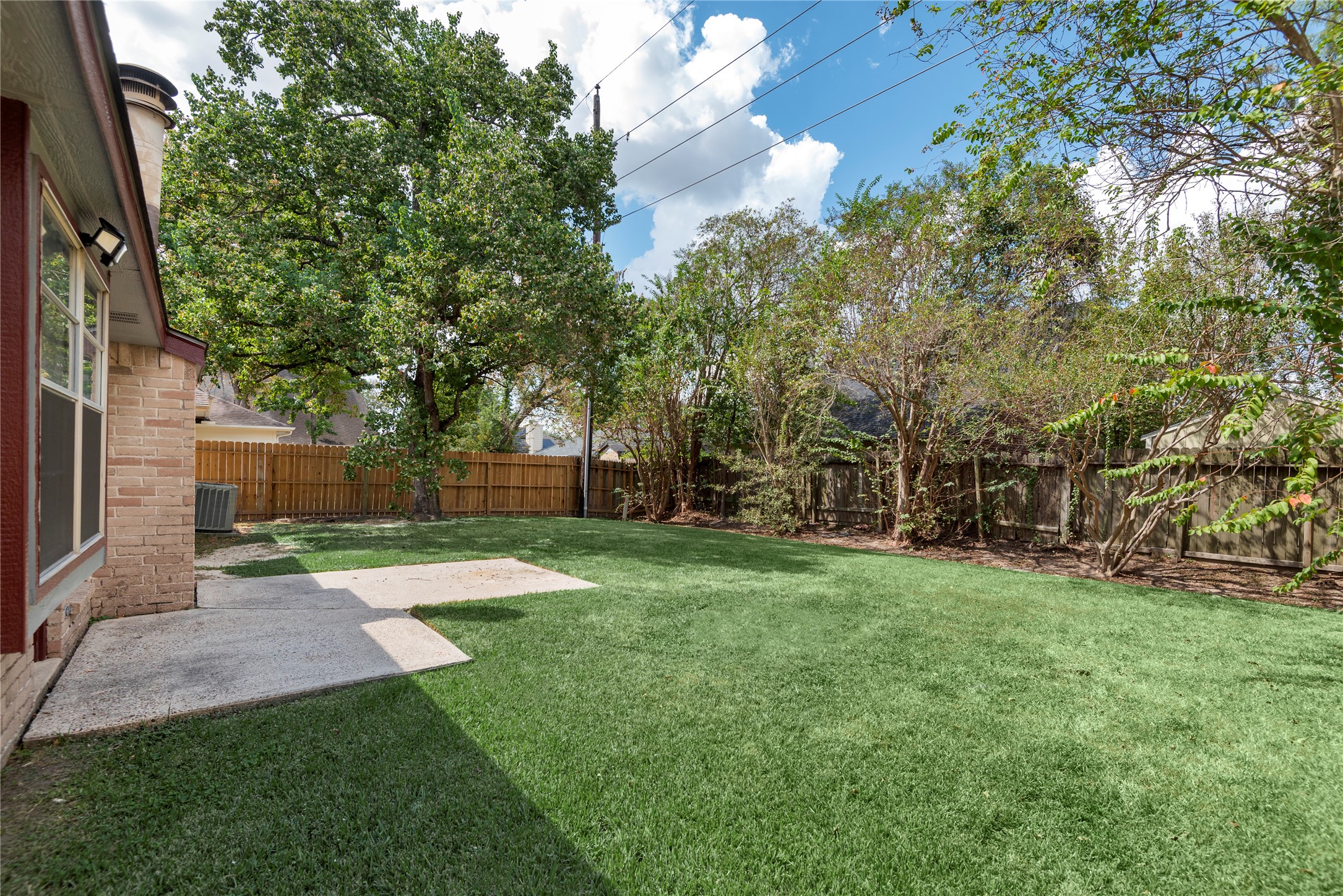 4919 Tealgate Drive Spring, TX 77373 - Photo 38 of 38 a view of a yard with plants and trees