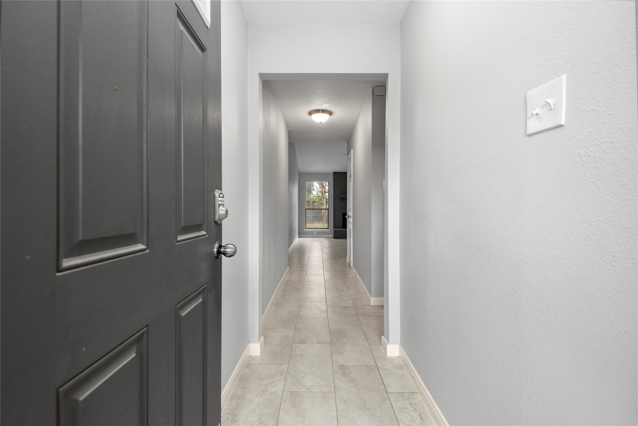 4919 Tealgate Drive Spring, TX 77373 - Photo 5 of 38 a view of a hallway with wooden floor