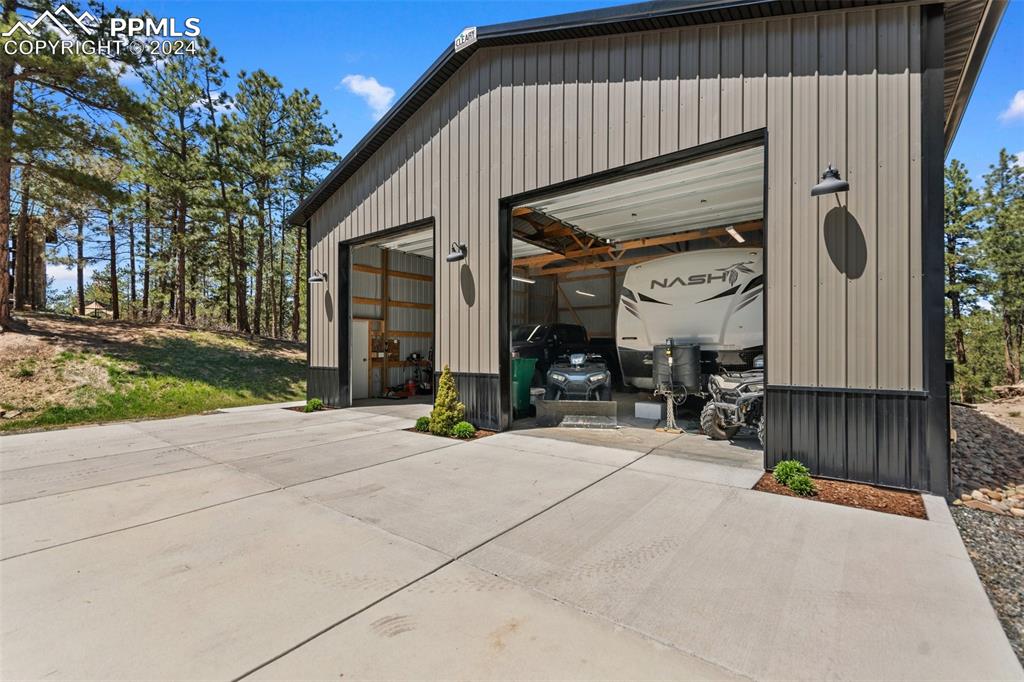 5090 South Perry Park Road Sedalia, CO 80135 - Photo 7 of 50 a backyard of a house with seating space