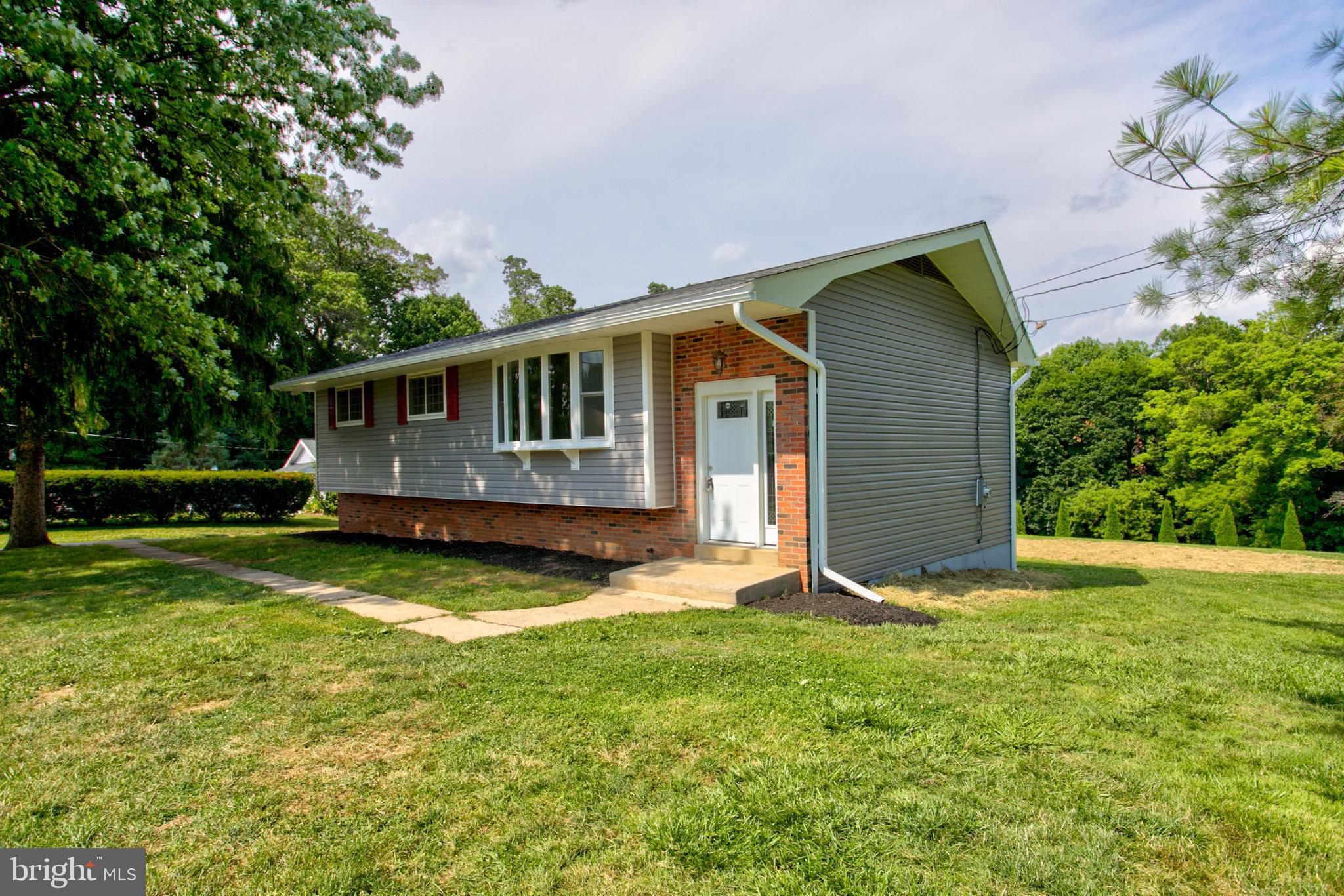 1229 Rawlinsville Road New Providence, PA 17560 - Photo 2 of 29 a view of a house with a yard and sitting area