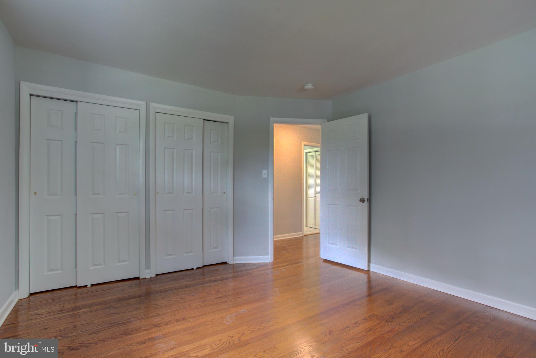 1229 Rawlinsville Road New Providence, PA 17560 - Photo 20 of 29 a view of an empty room with wooden floor