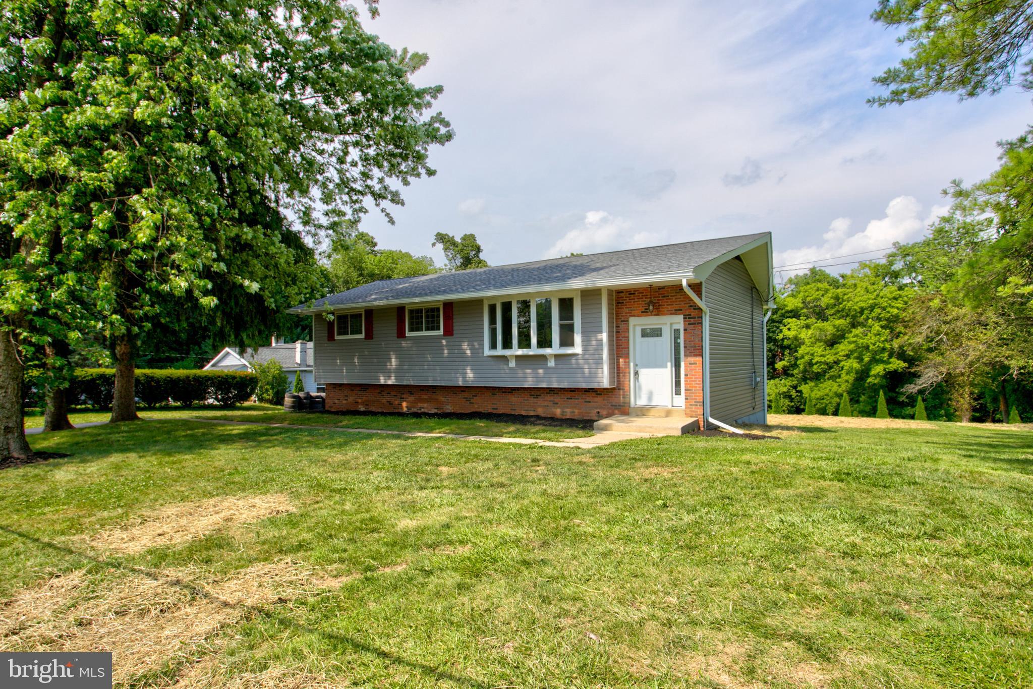 1229 Rawlinsville Road New Providence, PA 17560 - Photo 3 of 29 a view of house with a garden