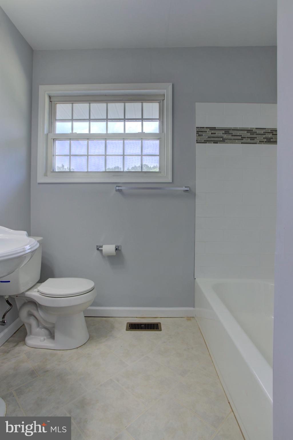 1229 Rawlinsville Road New Providence, PA 17560 - Photo 22 of 29 a bathroom with a toilet a sink and a bathtub
